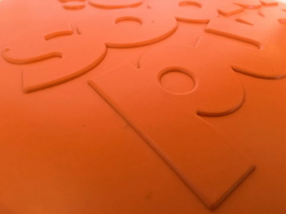 Bottle Top Flyer Durable Rubber Retrieving Frisbee - Orange From SodaPup